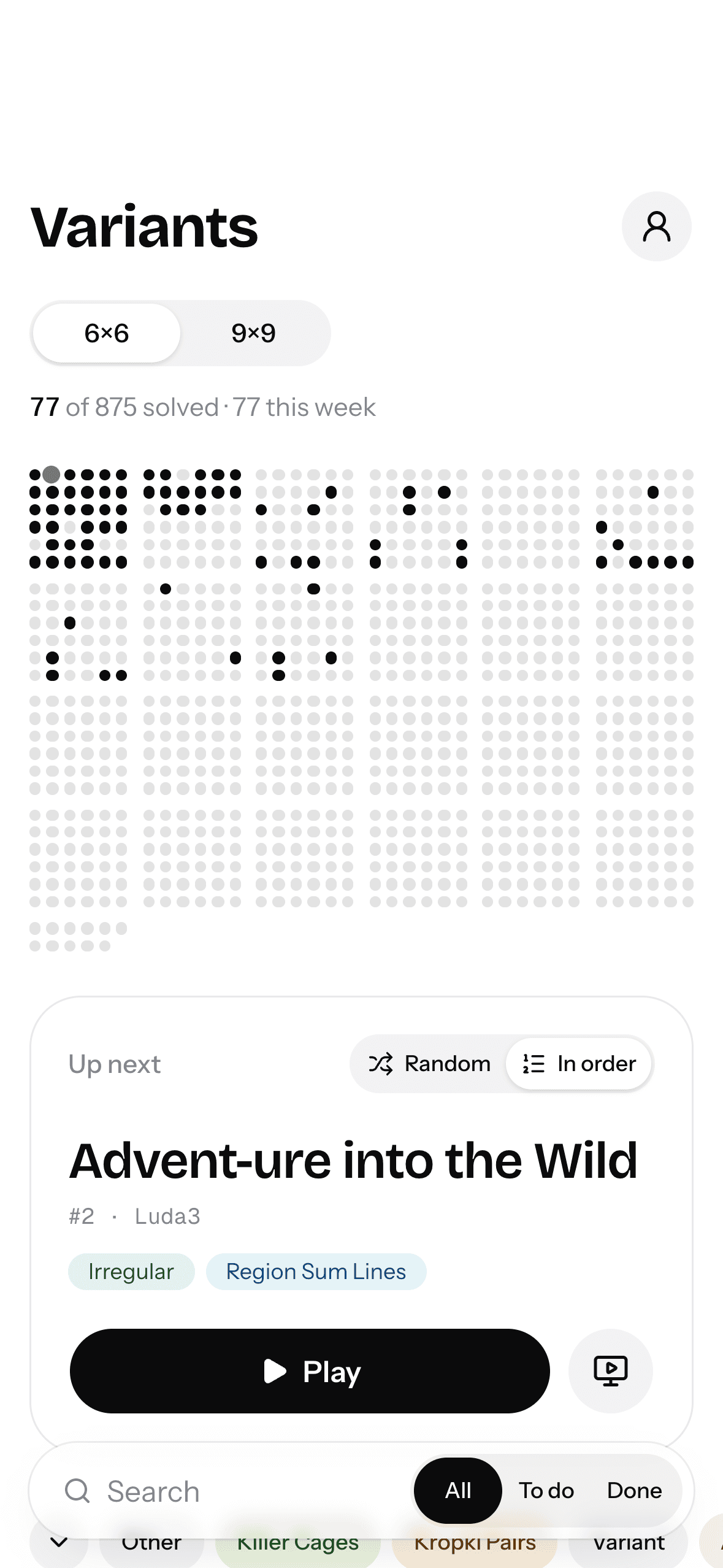 The Variants app on an iPhone, showing solved puzzles and the next one to play